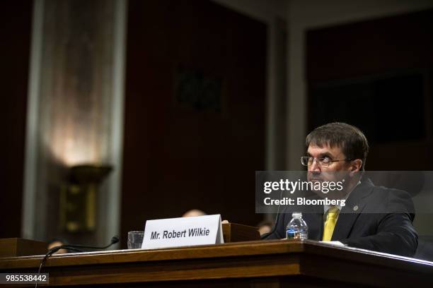 Robert Wilkie, secretary of Veterans Affairs nominee for U.S. President Donald Trump, listens during a confirmation hearing before the Senate...