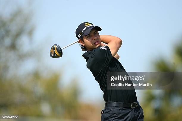Manuel Villegas hits a shot during the second round of the Chitimacha Louisiana Open at Le Triomphe Country Club on March 26, 2010 in Broussard,...