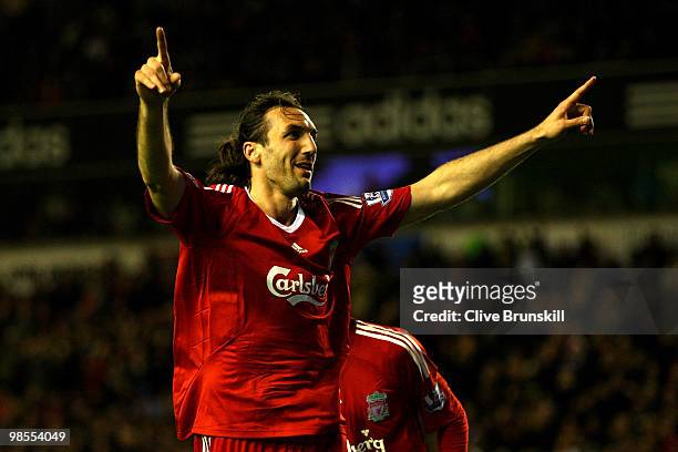 Sotiros Kyrgiakos of Liverpool celebrates scoring his team's third goal during the Barclays Premier League match between Liverpool and West Ham...