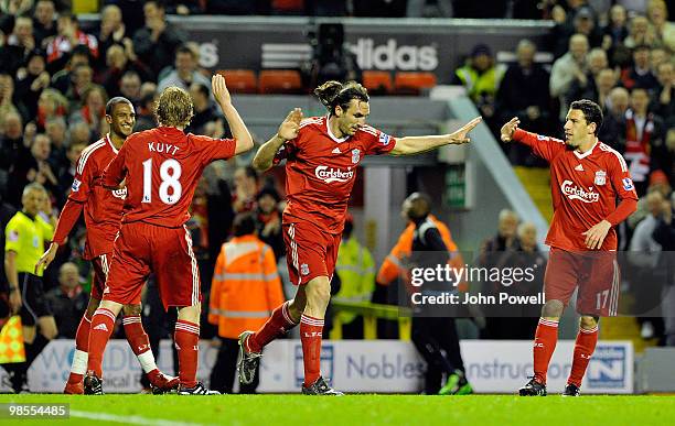 Sotirios Kyrgiakos of Liverpool celebrates after scoring the third during the Barclays Premier League match between Liverpool and West ham United at...