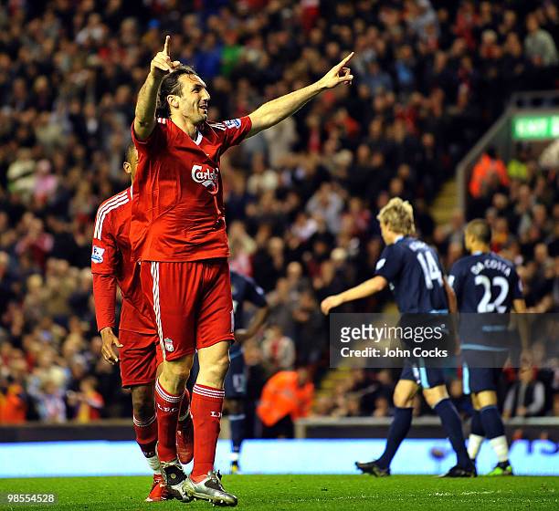 Sotirios Kyrgiakos of Liverpool celebrates after scoring the third during the Barclays Premier League match between Liverpool and West ham United at...