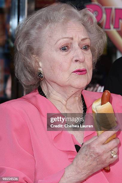 Actress Betty White unveils the "Naked" hot dog at Pink Hot Dogs at Universal CityWalk on April 19, 2010 in Universal City, California.