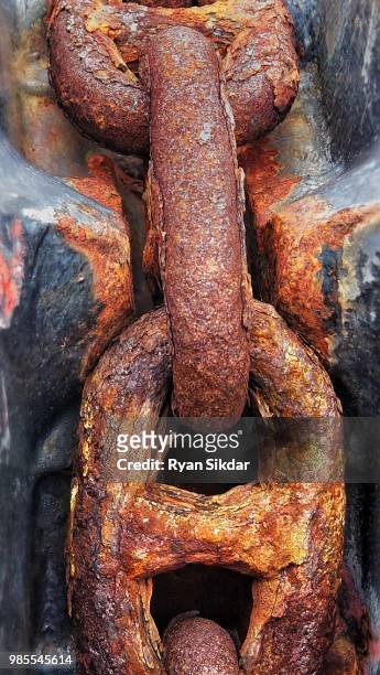orange, brown, yellow rust on ferry boat anchor chain - anchor chain stock pictures, royalty-free photos & images