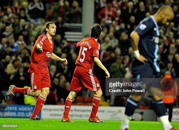 Sotirios Kyrgiakos of Liverpool celebrates after scoring the third during the Barclays Premier League match between Liverpool and West ham United at...