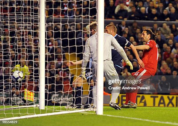 Sotirios Kyrgiakos of Liverpool scores Liverpool's third during the Barclays Premier League match between Liverpool and West ham United at Anfield on...