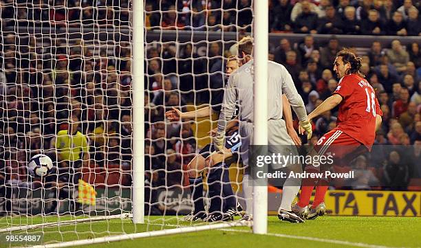Sotirios Kyrgiakos of Liverpool scores Liverpool's third during the Barclays Premier League match between Liverpool and West ham United at Anfield on...
