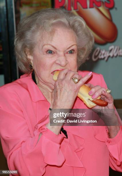 Actress Betty White attends the opening of Pink's Hot Dogs and the unveiling of the Betty White "Naked" Hot Dog at Pink's Universal CityWalk on April...