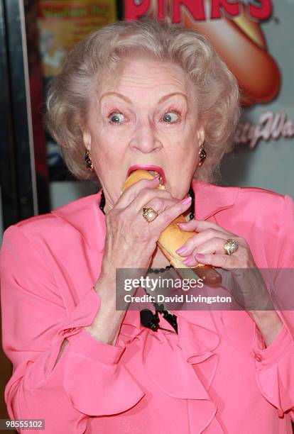 Actress Betty White attends the opening of Pink's Hot Dogs and the unveiling of the Betty White "Naked" Hot Dog at Pink's Universal CityWalk on April...