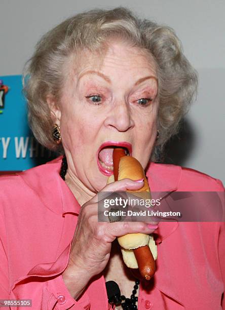 Actress Betty White attends the opening of Pink's Hot Dogs and the unveiling of the Betty White "Naked" Hot Dog at Pink's Universal CityWalk on April...