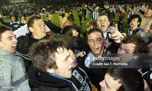 Andy Carroll celebrates with fans after the Coca Cola Championship match between Plymouth Argyle and Newcastle United at the Home Park on April 19,...