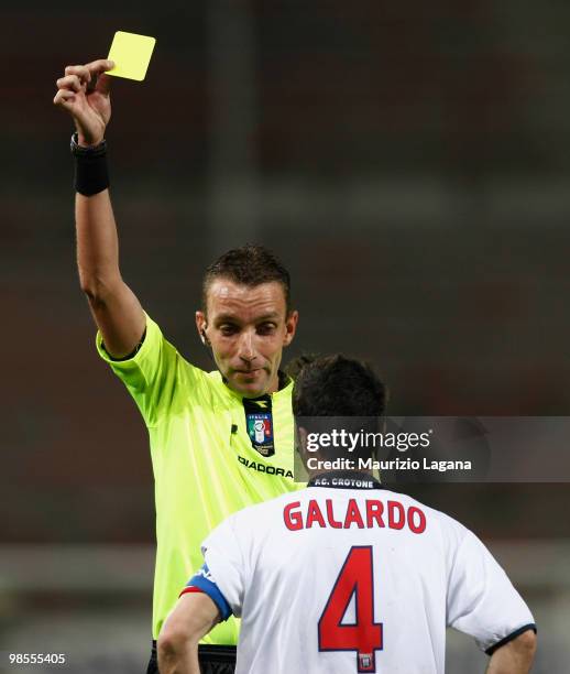 Referee Paolo Mazzoleni shows a yellow card to Antonio Galardo of Fc Crotone during the Serie B match between Reggina Calcio and FC Crotone at Stadio...