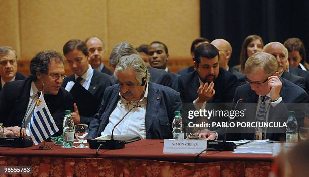 Uruguayan President Jose Mujica his Foreign Affairs Minister Luis Almagro and Australia's Trade minister Simon Crean, take part in the opening...