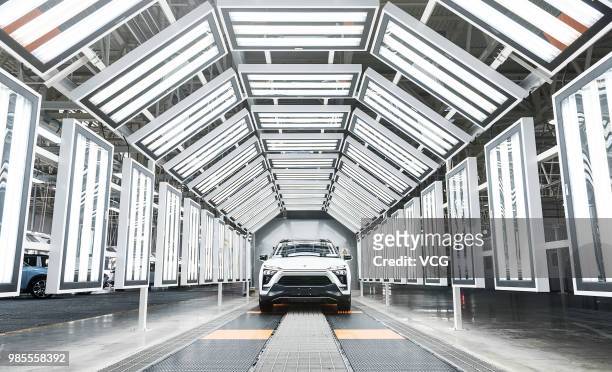 The assembly line of NIO ES8 electric vehicle is seen at a plant jointly built by Chinese automaker Anhui Jianghuai Automobile Group Corp., Ltd. And...