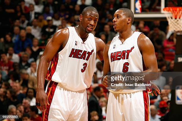 Dwyane Wade and Mario Chalmers of the Miami Heat talk on the court during the game against the Los Angeles Lakers on March 4, 2010 at American...