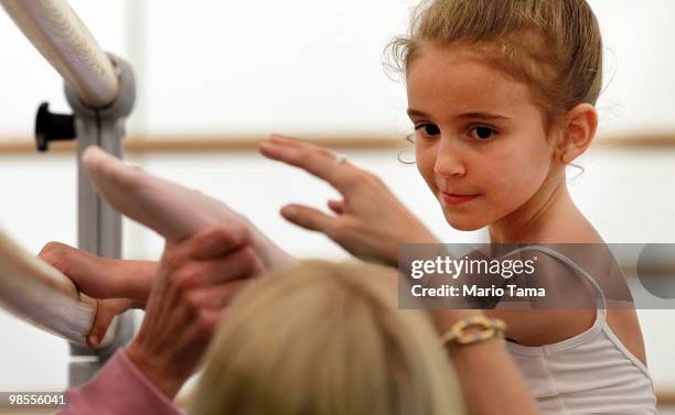 Six-year-old Angelina Porcelli auditions for a coveted spot at the famed School of American Ballet in the Rose Building at Lincoln Center April 19,...