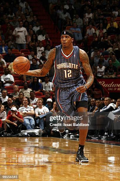 Tyrus Thomas of the Charlotte Bobcats moves the ball up court during the game against the Miami Heat at American Airlines Arena on March 20, 2010 in...