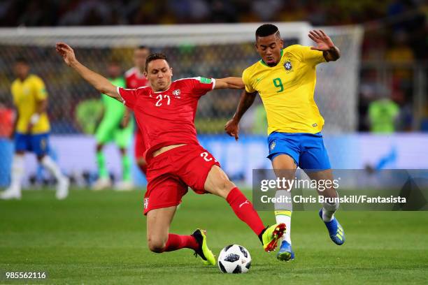 Gabriel Jesus of Brazil is tackled by Nemanja Matic of Serbia during the 2018 FIFA World Cup Russia group E match between Serbia and Brazil at...
