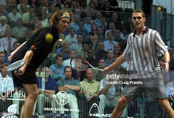 Jonathon Power of Canada [left] in action during his semi-final match with David Palmer of Australia in the Halifax Equitable Super Squash Finals at...