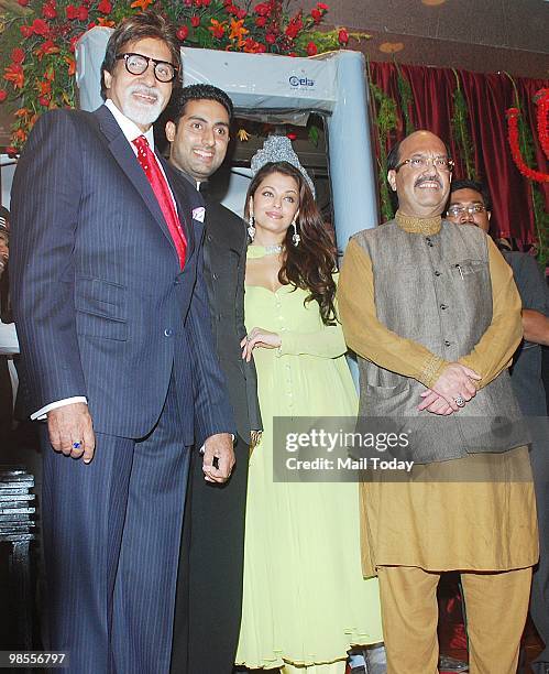 Amitabh, Abhishek and Aishwarya Rai Bachchan with Amar Singh at the wedding reception of Laila Khan and Farhan Furniturewala in Mumbai on April 16,...