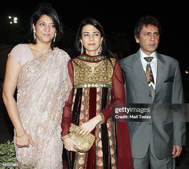 Priya Dutt with sister Namrata and brother-in-law Kumar Gaurav at the wedding reception of Laila Khan and Farhan Furniturewala in Mumbai on April 16,...