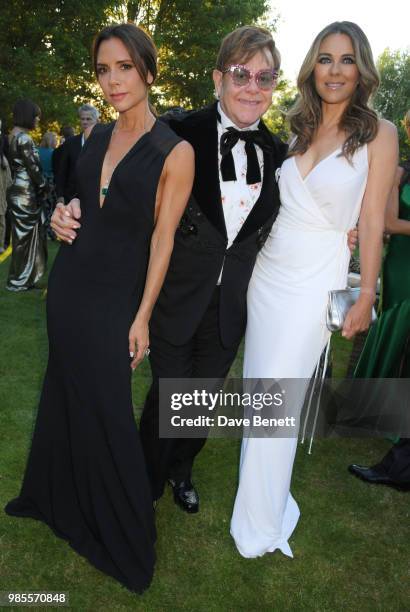 Victoria Beckham, Sir Elton John and Elizabeth Hurley attend the Argento Ball for the Elton John AIDS Foundation in association with BVLGARI & Bob...