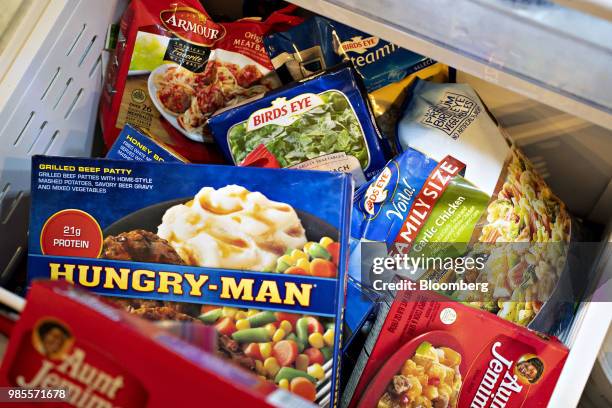 Packages of Pinnacle Foods Inc. Birds Eye, Hungry-Man, Aunt Jemima Frozen Breakfast, and Armour brand frozen foods are arranged for a photograph in...