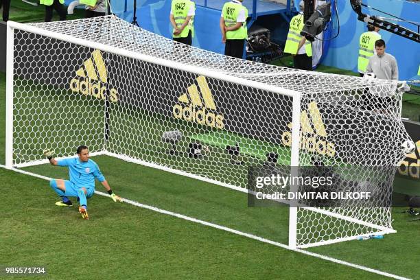 Costa Rica's goalkeeper Keylor Navas reacts as he takes Switzerland's second goal during the Russia 2018 World Cup Group E football match between...