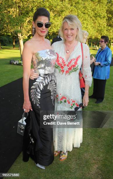 Christina Estrada and Louise Fennell attend the Argento Ball for the Elton John AIDS Foundation in association with BVLGARI & Bob and Tamar Manoukian...