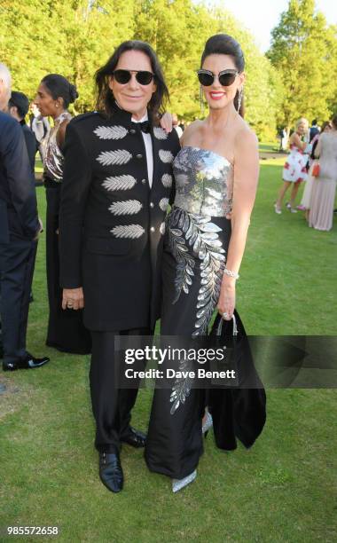 George Blodwell and Christina Estrada attend the Argento Ball for the Elton John AIDS Foundation in association with BVLGARI & Bob and Tamar...