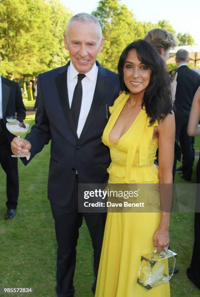 Carl Michaelson and Jackie St Clair attend the Argento Ball for the Elton John AIDS Foundation in association with BVLGARI & Bob and Tamar Manoukian...