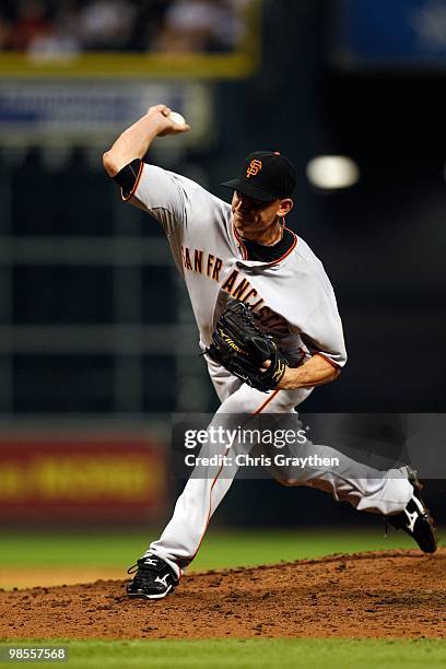 Brian Wilson of the San Francisco Giants pitches against the Houston Astros on Opening Day at Minute Maid Park on April 5, 2010 in Houston, Texas.