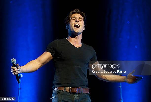Singer David Bustamante performs during a concert at the Lope de Vega Theatre on April 19, 2010 in Madrid, Spain.