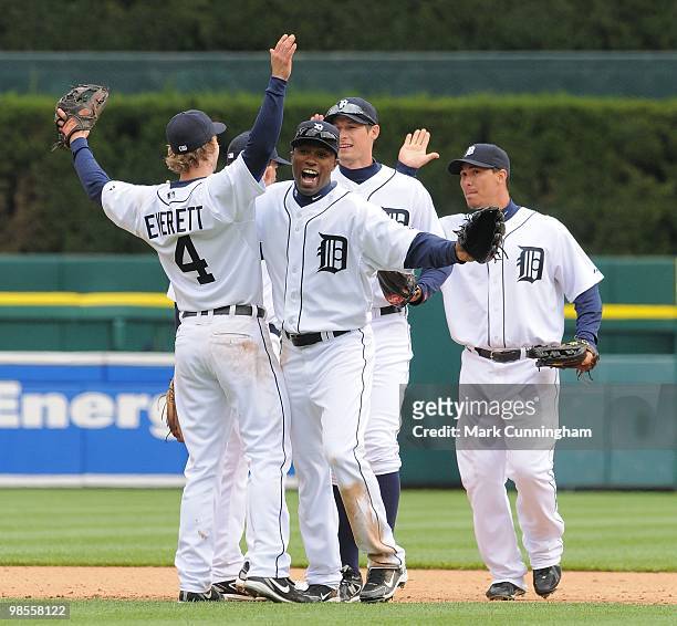 Adam Everett, Austin Jackson, Don Kelly, and Magglio Ordonez of the Detroit Tigers celebrate the Opening Day victory against the Cleveland Indians at...