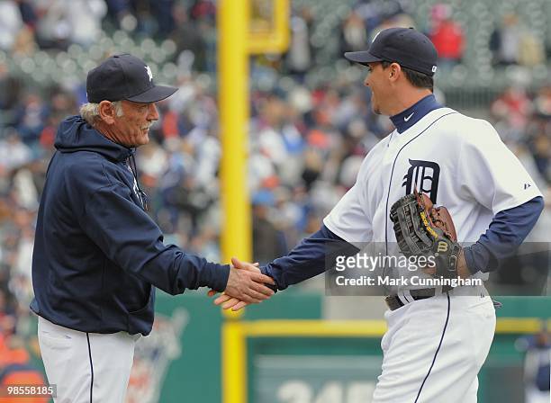 Manager Jim Leyland and Magglio Ordonez of the Detroit Tigers shake hands after the Opening Day victory against the Cleveland Indians at Comerica...