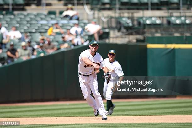 Kevin Kouzmanoff of the Oakland Athletics fielding during the game against the Seattle Mariners at the Oakland Coliseum in Oakland, California on...