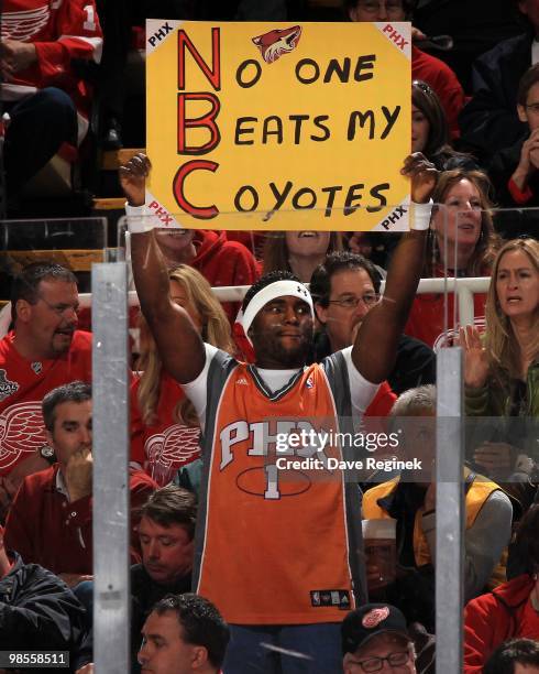 Fan holds a sign during Game Three of the Eastern Conference Quarterfinals of the 2010 NHL Stanley Cup Playoffs between the Phoenix Coyotes and the...