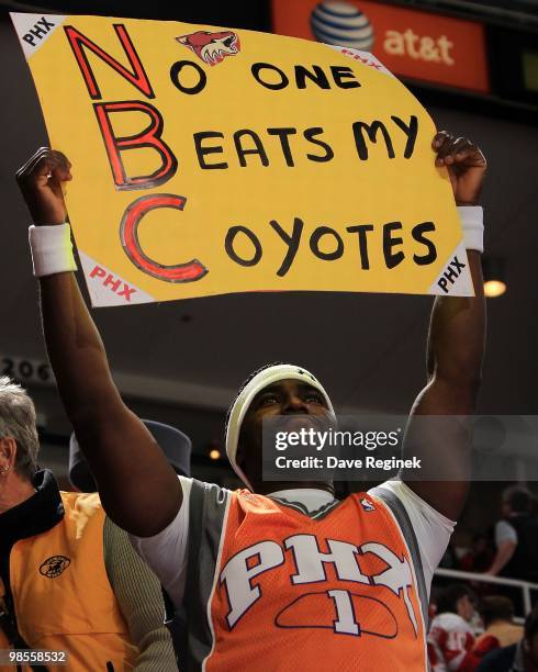Fan holds a sign during Game Three of the Eastern Conference Quarterfinals of the 2010 NHL Stanley Cup Playoffs between the Phoenix Coyotes and the...