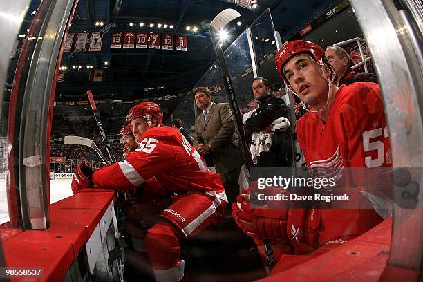 Niklas Kronwall and Jonathan Ericsson of the Detroit Red Wings watch the game actoin from the bench during Game Three of the Eastern Conference...