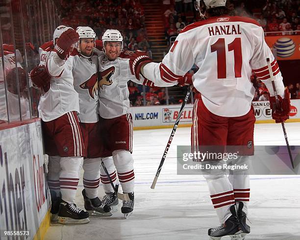 Petr Prucha celebrates his goal with Adrian Aucoin Derek Morris and Martin Hanzal of the Phoenix Coyotes during Game Three of the Eastern Conference...