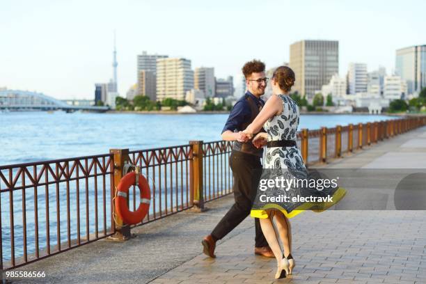 swing dancers at sunset - swing dance stock pictures, royalty-free photos & images