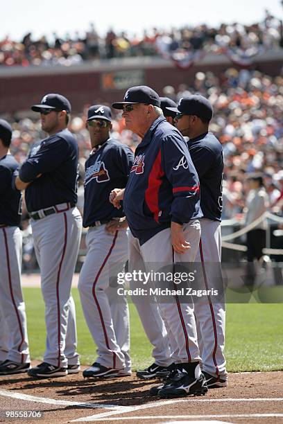 Manager Bobby Cox of the Atlanta Braves standing on the fielding during introductions prior to the game against the San Francisco Giants on Opening...