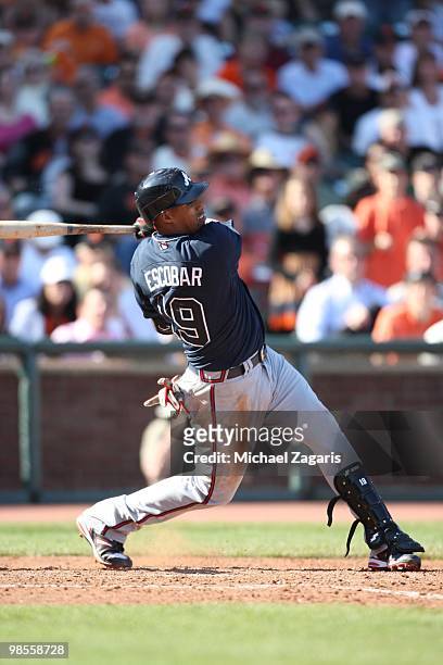Yunel Escobar of the Atlanta Braves hitting during the game against the San Francisco Giants on Opening Day at AT&T in San Francisco, California on...