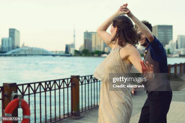 swing dancers at sunset - jive dancing stock pictures, royalty-free photos & images