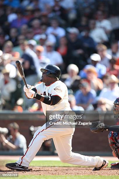 Juan Uribe of the San Francisco Giants hitting during the game against the Atlanta Braves on Opening Day at AT&T in San Francisco, California on...