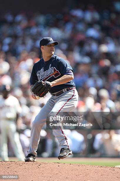 Tim Hudson of the Atlanta Braves pitching during the game against the San Francisco Giants on Opening Day at AT&T in San Francisco, California on...