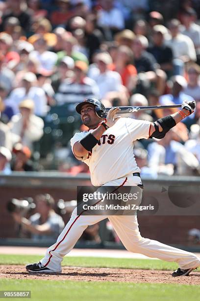 Bengie Molina of the San Francisco Giants hitting during the game against the Atlanta Braves on Opening Day at AT&T in San Francisco, California on...