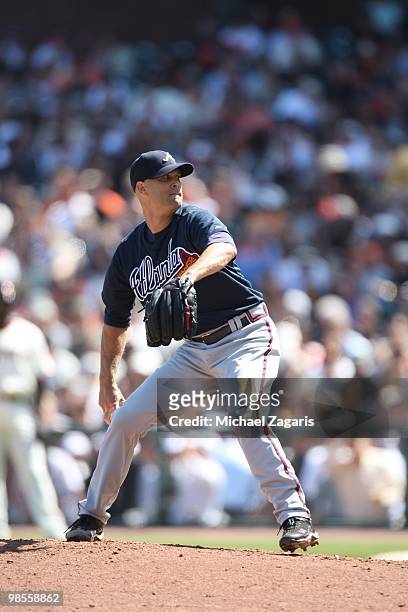 Tim Hudson of the Atlanta Braves pitching during the game against the San Francisco Giants on Opening Day at AT&T in San Francisco, California on...