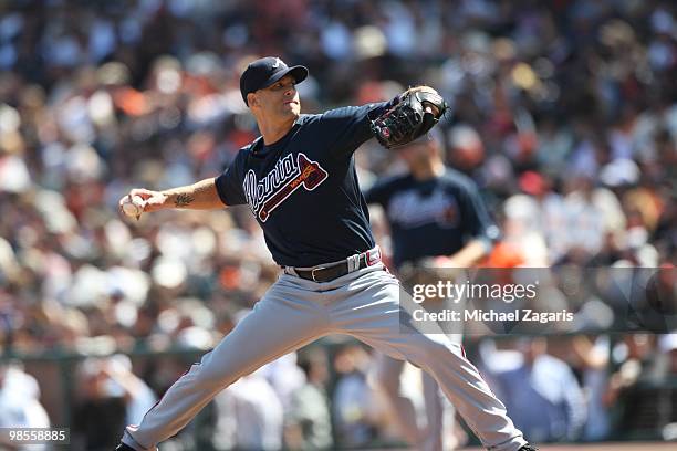 Tim Hudson of the Atlanta Braves pitching during the game against the San Francisco Giants on Opening Day at AT&T in San Francisco, California on...