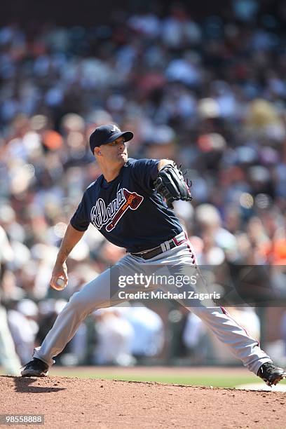 Tim Hudson of the Atlanta Braves pitching during the game against the San Francisco Giants on Opening Day at AT&T in San Francisco, California on...