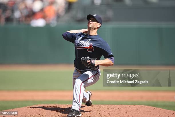 Tim Hudson of the Atlanta Braves pitching during the game against the San Francisco Giants on Opening Day at AT&T in San Francisco, California on...